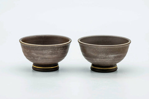 The pair at a three-quarter angle, showing the rims and exteriors.