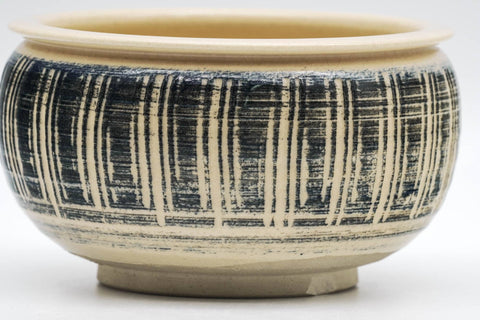 Tezumi — Japanese Kensui - Beige Brush Glazed Striped Water Bowl - 400ml — tipped to show the interior