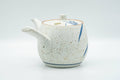 Tezumi — Japanese Tea Set - Blue Floral White Matte Glazed Arita-yaki Debeso Kyusu Teapot and 5 Yunomi Teacups — the cups grouped together