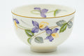 Japanese Teacups - Set of 5 Kozan Kiln Purple Floral Mino-yaki Porcelain Yunomi - closeup of a single cup painted with a purple iris flower and a blue rim