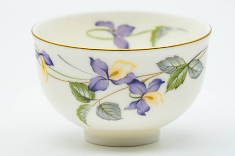 Japanese Teacups - Set of 5 Kozan Kiln Purple Floral Mino-yaki Porcelain Yunomi - closeup of a single cup painted with a purple iris flower and a blue rim