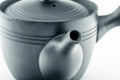 Three-quarter view showing the spout, lid on.