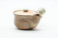Japanese Kyusu - Weathered Beige Glazed Hagi-yaki Ceramic Filter Teapot - 240ml - three-quarter view of the weathered beige Hagi-glazed body, lid on and side handle to the right