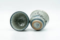 Tezumi — Japanese Teacups - Pair of Celadon Village Obori Soma-yaki Yunomi - 80ml — three-quarter view