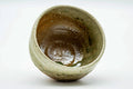 Overhead view looking into the Shigaraki chawan, showing green celadon pooling inside