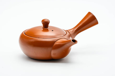 Front view of the kyusu showing the rounded body, spout and side handle.