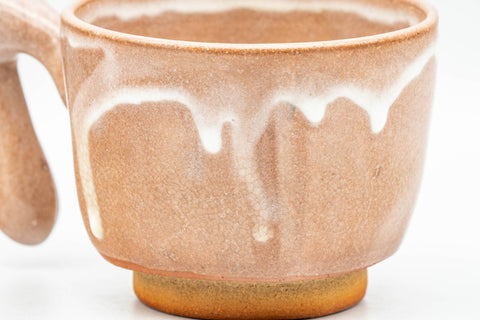 Tezumi — Japanese Teacup - Beige White Drip-Glazed Hagi-yaki Ushirode Yunomi - 110ml — tipped to show the interior