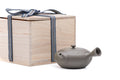 Mogake yakishime unglazed Tokoname kyusu teapot with side handle - shown beside its presentation box