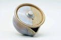 The houhin teapot with its lid removed, showing the interior.
