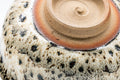 Tezumi — Japanese Matcha Bowl - Black Yellow Hare's Fur Glazed Chawan - 250ml — inverted showing the foot ring