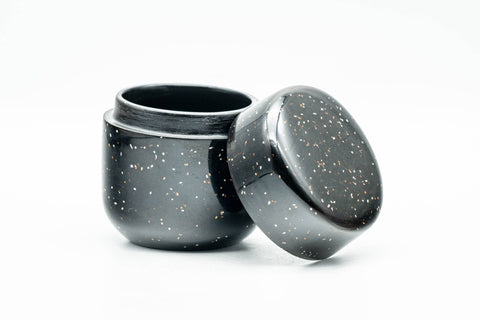 Japanese Natsume - Heavy Speckled Stone Matcha Tea Caddy - 50ml - caddy with lid removed and set beside it, speckled black finish