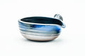 Front view from above showing the streaky blue-grey glaze and wide mouth.
