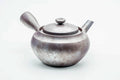 Front view of the large kyusu showing the spout, lid on.