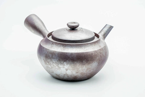 Front view of the large kyusu showing the spout, lid on.