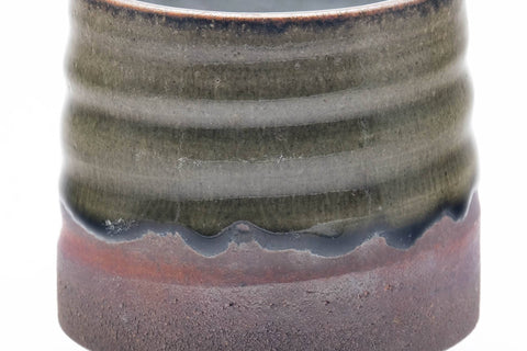 Tezumi — Japanese Teacup - Large Green Drip-Glazed Yunomi - 250ml — tipped to show the interior