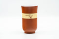 Tezumi — Japanese Teacup - 秋景 Shūkei - Tall Plum Blossoms Yellow Striped Tokoname-yaki Yunomi - 140ml — front view