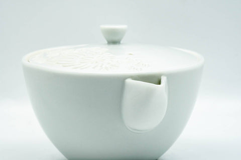 Japanese Houhin - Floral Engraved Arita-yaki Ceramic Filter Porcelain Teapot - 230ml - angled view with the lid in place