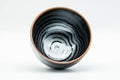 Japanese Teacup - Wavy Tenmoku Glazed Guinomi - 50ml - overhead view showing the swirled glazed interior