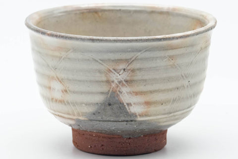 Tezumi — Japanese Teacup - Grey Pink Gohonte Hagi-yaki Yunomi - 100ml — tipped to show the interior