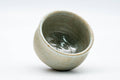 Tezumi — Japanese Teacup - Speckled Beige Gray Glazed Shigaraki-yaki Yunomi - 150ml — three-quarter view