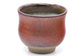 Tezumi — Japanese Teacup - Red Speckled Fish Yunomi - 160ml — tipped to show the interior