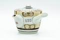 Japanese Tea Set - Gold White Chrysanthemum Kutani-yaki Kyusu Teapot with 2 Yunomi Teacups - angled view of the teapot with lid