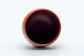 Tezumi — Japanese Teacup - Calligraphy Engraved Red Shudei Tokoname-yaki Yunomi - 80ml — three-quarter view