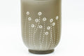 Japanese Teacup - Floral Green Ryokudei Tokoname-yaki Yunomi - 130ml - closeup of the white flower sprigs on the green clay