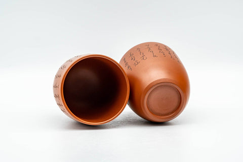 Tezumi — Japanese Teacups - Pair of Calligraphy Engraved Tokoname-yaki Yunomi - 120ml — three-quarter view