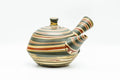Japanese Kyusu - Green, Red, and Yellow Swirling Nerikomi Tokoname-yaki Do-ake Teapot - 240ml - three-quarter view showing the spout