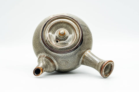 Japanese Tea Set - Tanuki Raccoon Dog Kyusu and Yunomi - top-down view of the teapot showing the lid and ceramic strainer
