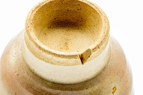 Close-up of the interior base showing the peach gohonte spots and crazed glaze.