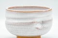 Japanese Teacup - Akiyama Kiln Milky White Glazed Thumb-Indented Yunomi - 150ml - side view showing the thumb indentation
