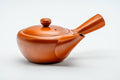Japanese Kyusu - Smooth Red Shudei Tokoname-yaki Ceramic Teapot - 270ml - three-quarter front view showing the lid knob and side handle