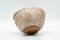 Tezumi — Japanese Matcha Bowl - Floral Geometric White Glazed Chawan - 300ml — top-down view of the interior