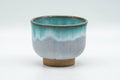 Tezumi — Japanese Teacup - Turquoise Drip-Glazed Agano-yaki Yunomi - 100ml — front view from another angle