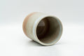 Tezumi — Japanese Teacup - Beige White Glazed Tsutsu-gata Hagi-yaki Yunomi - 140ml — three-quarter view
