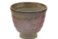 Tezumi — Japanese Teacup - Red Yellow Drip-Glazed Yunomi - 90ml — tipped to show the interior