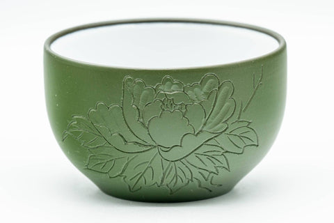 Japanese Teacups - Pair of Green Ryokudei Tokoname-yaki Yunomi - 120ml - closeup of one cup showing the engraved floral decoration on the green glaze