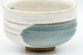 Tezumi — Japanese Matcha Bowl - Crazed Teal Hakeme Glazed Chawan - 400ml — tipped to show the interior
