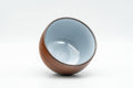 Tezumi — Japanese Teacup - Red Nerikomi White Inner Glazed Tokoname-yaki Yunomi - 90ml — three-quarter view