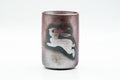 Banko-yaki yunomi teacup with a dark metallic purple-grey glaze, front view featuring a white leaping rabbit motif.