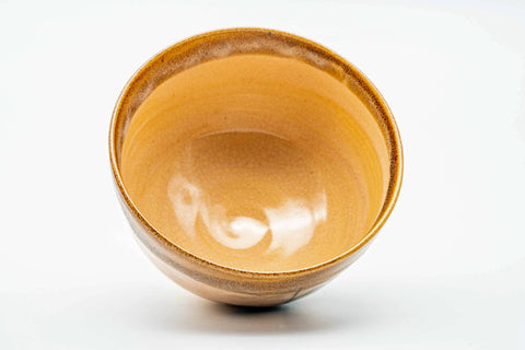 Overhead interior view of the bowl's glazed inside with subtle brushwork visible.