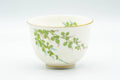 Japanese Teacups - Set of 5 Floral Lightweight Porcelain Yunomi - 125ml - front view of a single cup showing the green floral decoration with gold trim