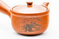 Japanese Kyusu - Mountainous Red Shudei Tokoname-yaki Mesh Teapot - 270ml - side view showing the engraved mountainous landscape on the body