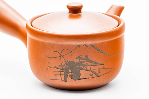 Japanese Kyusu - Mountainous Red Shudei Tokoname-yaki Mesh Teapot - 270ml - side view showing the engraved mountainous landscape on the body