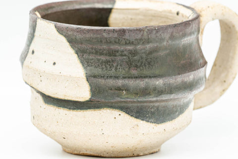 Tezumi — Japanese Teacup - Abstract Brown White Glazed Ushirode Yunomi - 200ml — tipped to show the interior