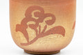 Tezumi — Japanese Teacup - Floral Textured Golden Red and White Inner Glazed Yunomi - 200ml — tipped to show the interior