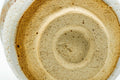 Overhead view into the cup, showing the glazed well.