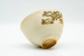 Japanese Teacup - Matte Beige Floral Kiyomizu-yaki Yunomi - 140ml - tilted view showing the foot and base with floral detail